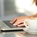 Want To Join The Irish Chapter of ISOC? Close up of a woman hands typing in a laptop in a coffee shop terrace in the street
** Note: Shallow depth of field