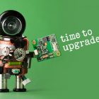 Why We’re Taking Our Control Panel Offline for 24 Hours Time to upgrade concept. Robot with abstract circuit chip. retro style toy character with funny black helmet head. green background