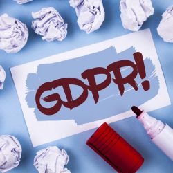 The Obligatory GDPR Update Handwriting text Gdpr Motivational Call. Concept meaning General Data Protection Regulation Information Safety written Painted Sticky Note Paper within paper balls plain background Marker.