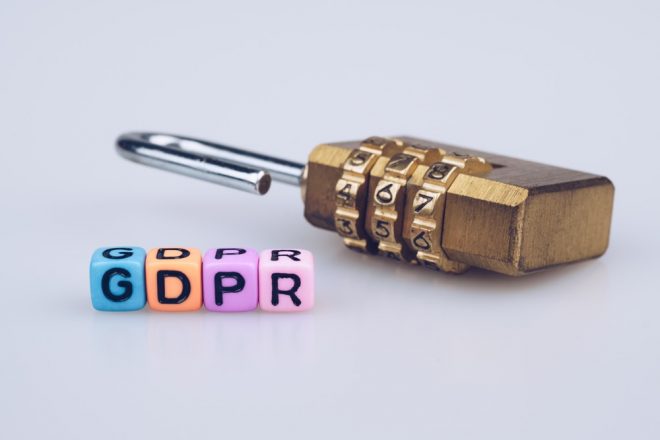GDPR word text written on colorful cube with padlock on white background
