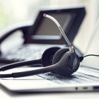 Getting Started With Hosting, Email, FTP and More VOIP headset headphones telephone and laptop concept for communication, it support, call center and customer service help desk