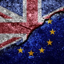 EU Domain Brexit Update eu and union jack flag on grunged and cracked background