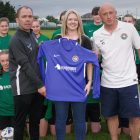 Blacknight Backs Carlow Girls for Gaynor Cup Leona Glover of Blacknight presents the new team jerseys to the Carlow U-15 Girls' Gaynor Cup Team