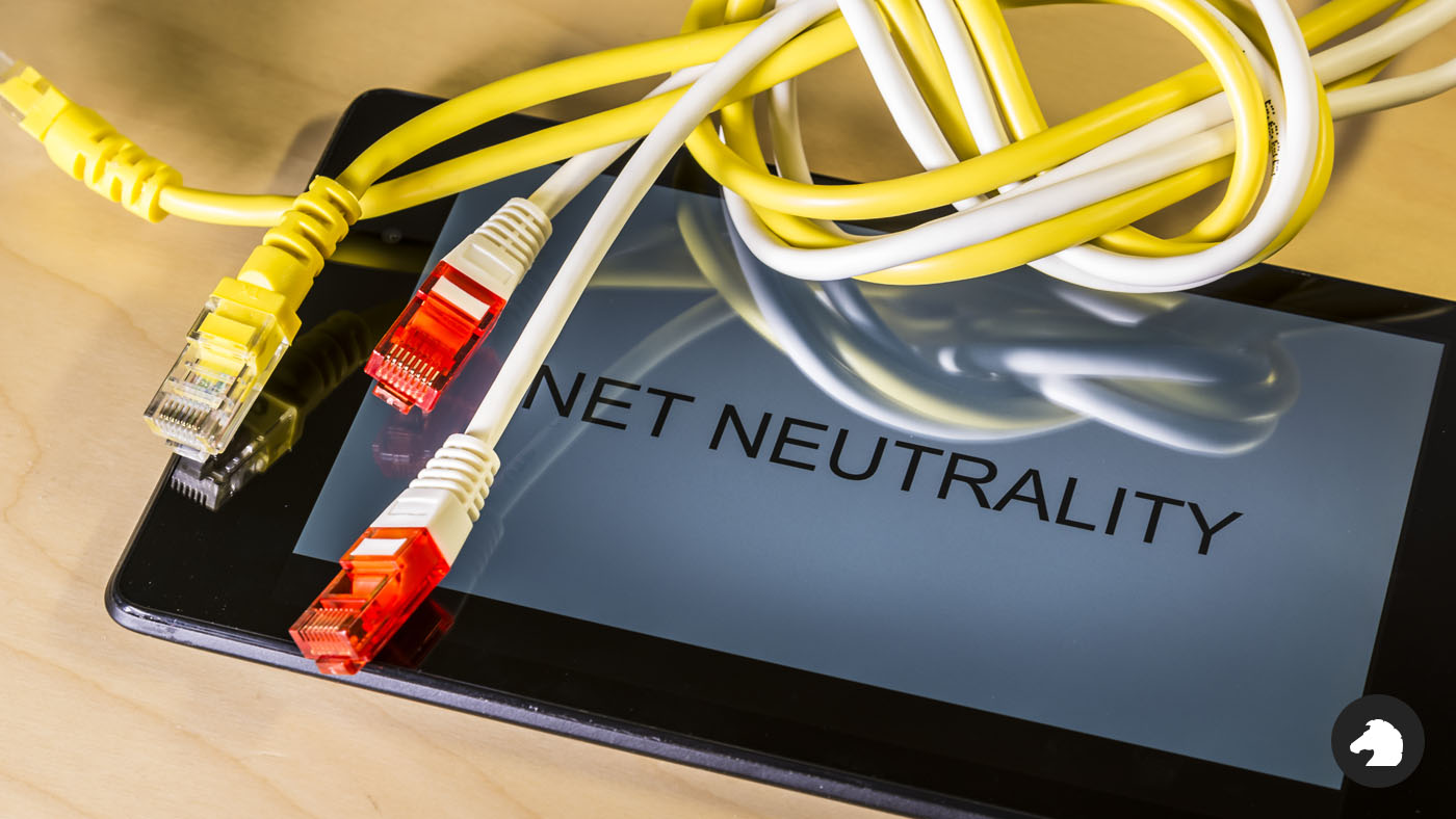 Tablet with Net Neutrality text partially covered by Ethernet cables